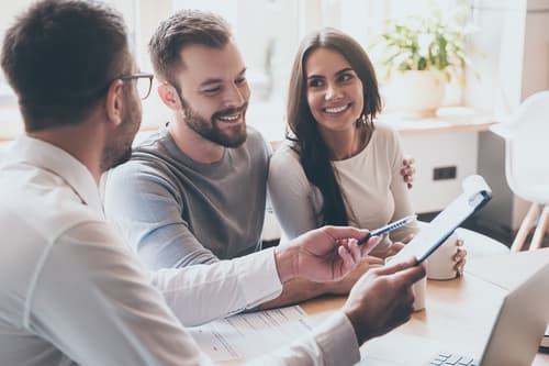 Couple meeting with insurance provider