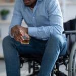 disabled man drinking alcohol