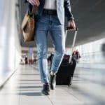 man traveling out of state at airport