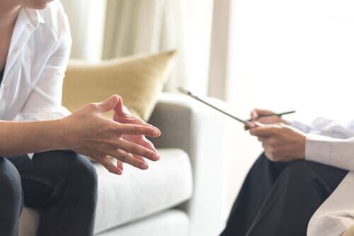 person receiving behavioral therapy for addiction treatment